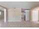 Spacious room showcasing the neutral interior and tile floors at 3207 N 45Th St, Tampa, FL 33605