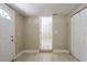 Entryway and living room featuring tile floor and entry door at 3207 N 45Th St, Tampa, FL 33605