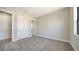 Bedroom featuring a large closet, neutral walls, and carpet flooring at 4541 Mondrian Ct, Sarasota, FL 34240
