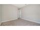 Neutral bedroom featuring neutral carpeting, paint and trim at 4541 Mondrian Ct, Sarasota, FL 34240