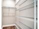 Walk-in closet features adjustable wire shelving for optimized storage at 4541 Mondrian Ct, Sarasota, FL 34240