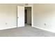Bright bedroom featuring neutral walls and plush carpeting at 523 Glenn Cross Dr, Ruskin, FL 33570