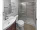 Modern bathroom featuring a vanity, toilet, and stand up glass shower at 7141 63Rd N St, Pinellas Park, FL 33781