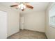 Bedroom with window and light colored wood-look tile flooring at 1501 Neil St, Plant City, FL 33563