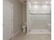 Bathroom featuring a walk-in shower with glass door, and updated fixtures at 22500 Provance Ave, Port Charlotte, FL 33954