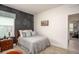 Unique bedroom featuring a chalkboard accent wall and sports decor at 22500 Provance Ave, Port Charlotte, FL 33954