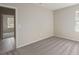 Cozy bedroom showcasing neutral colors and a bright window at 22500 Provance Ave, Port Charlotte, FL 33954