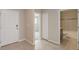 Hallway view, showing bathroom and bedroom access at 22500 Provance Ave, Port Charlotte, FL 33954