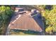 Aerial top-down shot of the roof on a boarded-up house with a complex roofline at 6098 San Salvador Rd, North Port, FL 34291