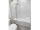 Clean bathroom featuring a shower and a white toilet at 9793 Rally Spring Loop, Wesley Chapel, FL 33545