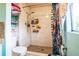 Bathroom features a large shower with white tile and a mosaic tiled shower floor at 7961 50Th N Ave, St Petersburg, FL 33709