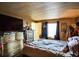 This bedroom has a large bed, natural light and closet space at 7961 50Th N Ave, St Petersburg, FL 33709