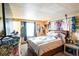 Bedroom features a large bed, natural light and closet at 7961 50Th N Ave, St Petersburg, FL 33709