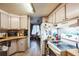 Functional kitchen featuring laminate counters and a white electric range at 7961 50Th N Ave, St Petersburg, FL 33709