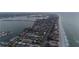 Stunning aerial view of beach community with waterfront homes and ocean access, offering luxurious coastal living at 2200 Bay Blvd # B, Indian Rocks Beach, FL 33785
