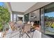 Outdoor balcony with seating and a view into the house at 2200 Bay Blvd # B, Indian Rocks Beach, FL 33785