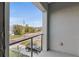 Balcony view of parked car and landscaping on a sunny day at 2200 Bay Blvd # B, Indian Rocks Beach, FL 33785