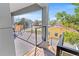 Outdoor balcony with seating and a view of the neighborhood at 2200 Bay Blvd # B, Indian Rocks Beach, FL 33785