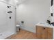Bathroom with walk in shower and modern sink at 2200 Bay Blvd # B, Indian Rocks Beach, FL 33785
