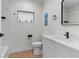 Modern bathroom with a sleek vanity, toilet, and bathtub at 2200 Bay Blvd # B, Indian Rocks Beach, FL 33785