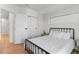 Well-lit bedroom featuring a full-sized bed, a window and closet at 2200 Bay Blvd # B, Indian Rocks Beach, FL 33785