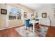 Dining area with large windows, a white table and chairs, and a view of the outdoors at 5802 Hatteras Palm Way, Tampa, FL 33615