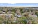 Expansive aerial view of home with mature trees and landscaping providing ultimate privacy at 12205 Kelly Ln, Thonotosassa, FL 33592