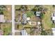 Birds eye view of the house and surrounding property with mature landscaping at 12205 Kelly Ln, Thonotosassa, FL 33592