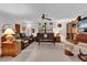 Bright living room featuring plush furniture, warm lighting, and a comfortable gathering space at 12205 Kelly Ln, Thonotosassa, FL 33592