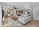 Open-concept living area with hardwood floors, neutral colors, and seamless flow at 1767 Colorado Ne Ave, St Petersburg, FL 33703
