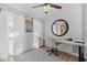 Bright home office with a desk, chair, and large window at 1767 Colorado Ne Ave, St Petersburg, FL 33703