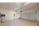 Spacious two car garage with epoxy flooring and ample room for storage at 3603 Lajuana Blvd, Wesley Chapel, FL 33543