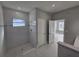 Elegant bathroom boasts a tiled walk-in shower and contemporary fixtures at 383 Yeager St, Port Charlotte, FL 33954
