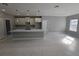 Spacious kitchen featuring marble countertops, a kitchen island, and stainless steel appliances at 383 Yeager St, Port Charlotte, FL 33954