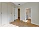 Bedroom view with built-in wardrobes and light-colored wood floors at 82 Venango St, Port Charlotte, FL 33954