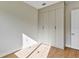 Bedroom with built in wardrobes and light wood floors at 82 Venango St, Port Charlotte, FL 33954