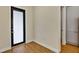 Inviting entryway with sleek flooring, modern door, and a view into adjacent rooms at 82 Venango St, Port Charlotte, FL 33954