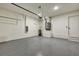 Spacious garage with a water heater, and an automatic garage door at 82 Venango St, Port Charlotte, FL 33954