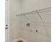 Unfinished laundry room, ready for washer and dryer hookups and customizable shelving at 82 Venango St, Port Charlotte, FL 33954