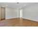 Open living area with recessed lighting and wood flooring throughout at 82 Venango St, Port Charlotte, FL 33954