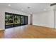 Spacious living room with recessed lighting and large glass doors to outdoor area at 82 Venango St, Port Charlotte, FL 33954