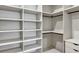 Walk-in closet with shelving and drawers to organize all belongings at 82 Venango St, Port Charlotte, FL 33954