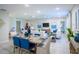 Open-concept living and dining area with ample natural light and stylish furnishings at 5048 Silver Bell Dr, Port Charlotte, FL 33948