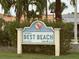 Florida's Best Beach sign in Clearwater, a charming marker set amidst lush greenery, close to shops and restaurants at 1000 Cove Cay Dr # 5E, Clearwater, FL 33760