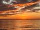 Beautiful sunset view over the ocean with colorful clouds, near a relaxing community at 1000 Cove Cay Dr # 5E, Clearwater, FL 33760