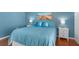 A serene bedroom with a king-size bed and coastal-inspired decor that creates a soothing atmosphere at 1000 Cove Cay Dr # 5E, Clearwater, FL 33760