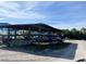 Covered boat storage area with many watercraft, providing convenient and secure accommodations for boating enthusiasts at 1000 Cove Cay Dr # 5E, Clearwater, FL 33760