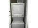 Efficiently designed stackable washer and dryer maximize space in a dedicated laundry area at 1000 Cove Cay Dr # 5E, Clearwater, FL 33760