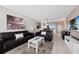 A stylish living room featuring contemporary furnishings and lots of light at 1000 Cove Cay Dr # 5E, Clearwater, FL 33760