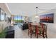 A spacious open-concept living area with access to a balcony, perfect for enjoying the outdoors at 1000 Cove Cay Dr # 5E, Clearwater, FL 33760